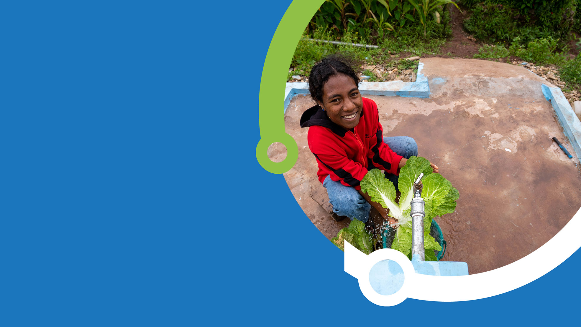 A blue and green graphic frame in PARTISIPA branding style encircling a picture of a young woman smiling up at the camera as she crouches down to wash a large, fresh lettuce plant at a community tap stand. 